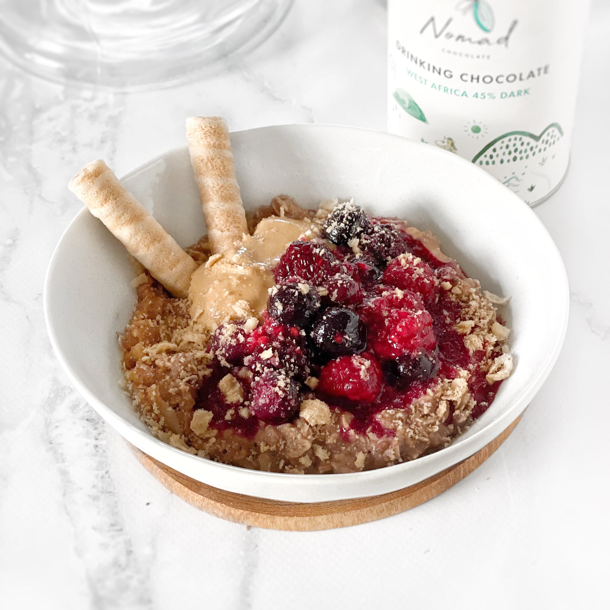 VEGAN CHOCOLATE OATS WITH HAZELNUT BUTTER & WARM BERRIES