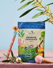 Load image into Gallery viewer, Nomad Drinking Chocolate Classic, Elin Matilda design with party blower, ice cream cone and Christmas bauble.