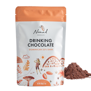 Nomad Chocolate Organic Drinking Chocolate Dominican 55% Dark bag with cocoa powder next, dairy free and gluten free