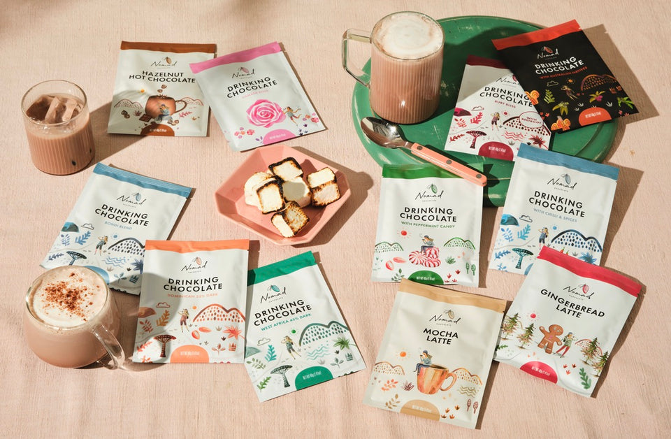 Image of nomad chocolates in 40g bags with hot chocolate and iced chocolate