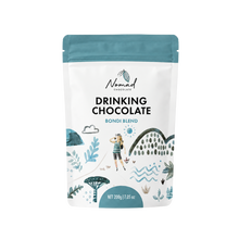 Load image into Gallery viewer, A stand-up pouch of Nomad Chocolate Drinking Chocolate Bondi Blend, 200g, featuring a white bag with a teal top and bottom, and a whimsical coastal illustration on the front.
