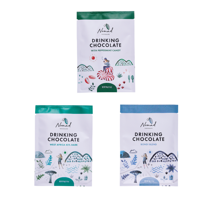Three packages of Nomad Drinking Chocolate on a white background. Nomad Chocolate 3 Mini Hot chocolates  each 40g, West Africa 45% Dark, Bondi Blend, Peppermint Candy.