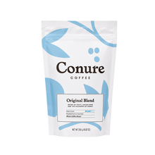 Load image into Gallery viewer, Conure Coffee Original Blend in a 250g white stand-up pouch with light blue abstract leaf designs and black text, shown on a plain white background.
