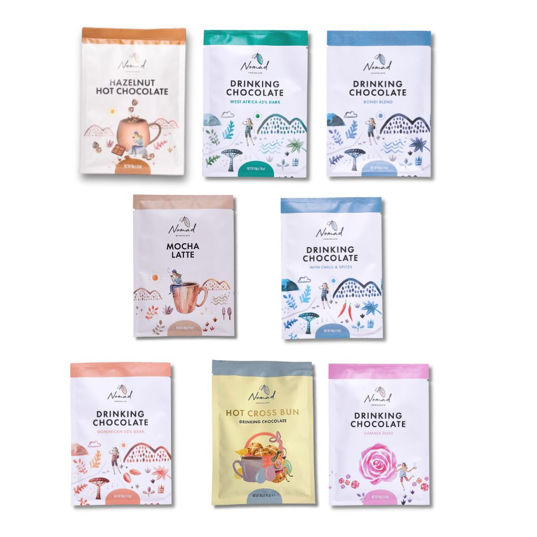 Nomad Chocolate Mini Taste Pack The Try them all bundle, set of 9 minis each 40g. West Africa 45% Dark, Bondi Blend, Dominican 55% Dark, Ancient Maya with Spices and Chilli, With Rose, Mocha Latte, Hot and Hazelnut Hot Chocolate Vegan, Dairy Free and Gluten Free.ross Bun Hot chocolate