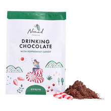 Load image into Gallery viewer, Nomad Drinking Chocolate with Peppermint Candy bag with cacao and candy candy next to bag