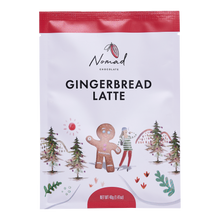Load image into Gallery viewer, Nomad Chocolate Gingerbread Latte 40g front of the bag. Label with girls holding hands with a gingerbread man, walking through the Christmas woods. All natural ingredients, gluten free.