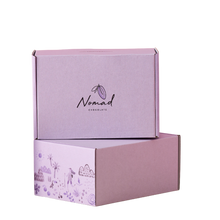 Load image into Gallery viewer, two gift boxes from Nomad chocolate one ont he top of each others. Australian made and recyclable 