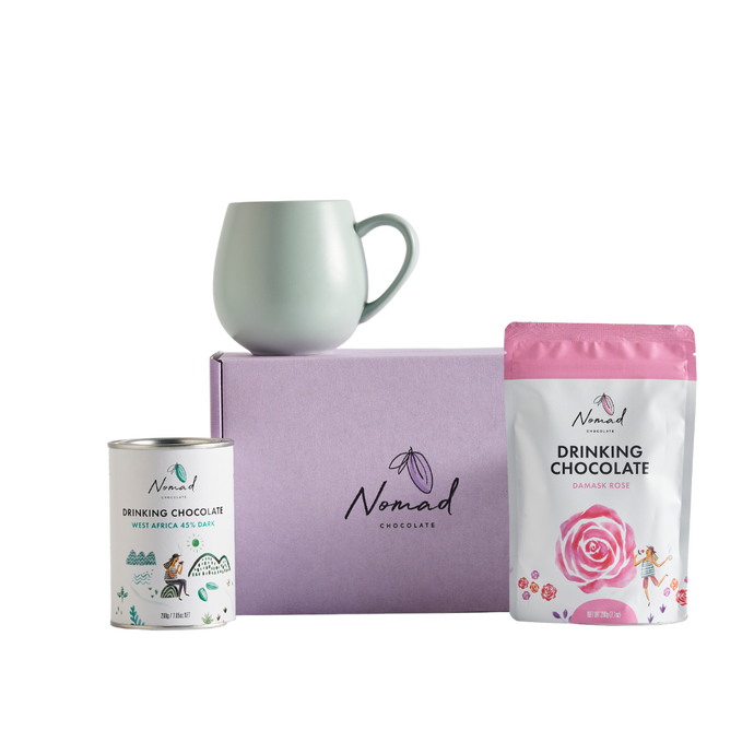 Nomad HOT CHOCOLATE AND MUG GIFT containing gift box in purple, nomad drinking chocolate west Africa 45% dark 200g, robert gordon cup in green and nomad drinking chocolate rose 200g. all dairy free, vegan and gluten free hot chocolates