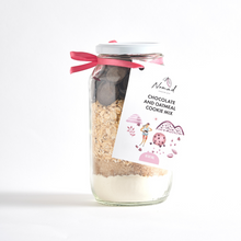 Load image into Gallery viewer, Oatmeal and chocolate cookie mix in the glass jar. perfect for baking cookies and a gift Mix contains flour, raw sugar, brown sugar, oats and chocolate buttons
