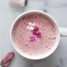 Load image into Gallery viewer, Nomad hot chocolate ruby bliss in the cup with flowers
